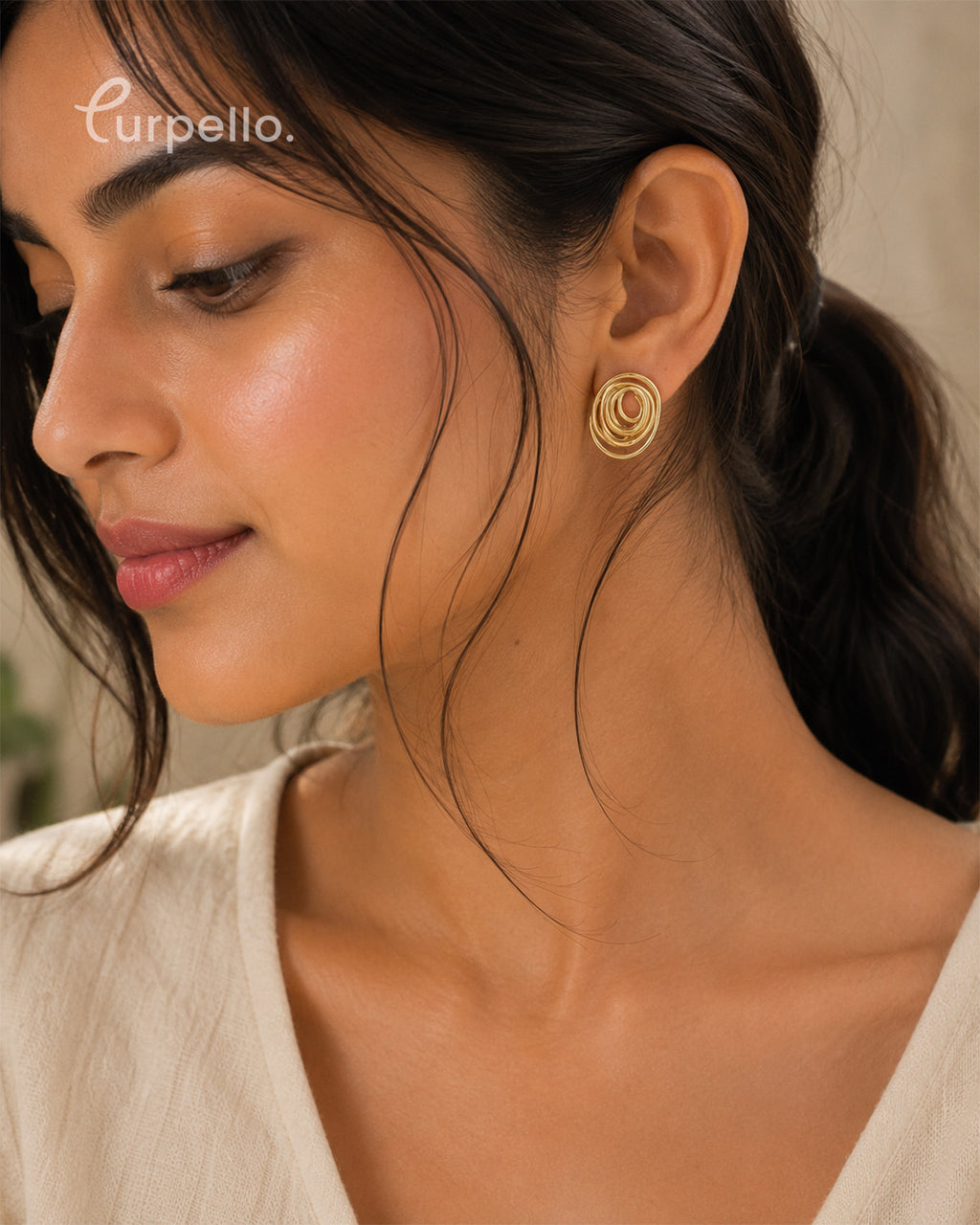 Purpello Modern Spiral Gold Stud Earrings