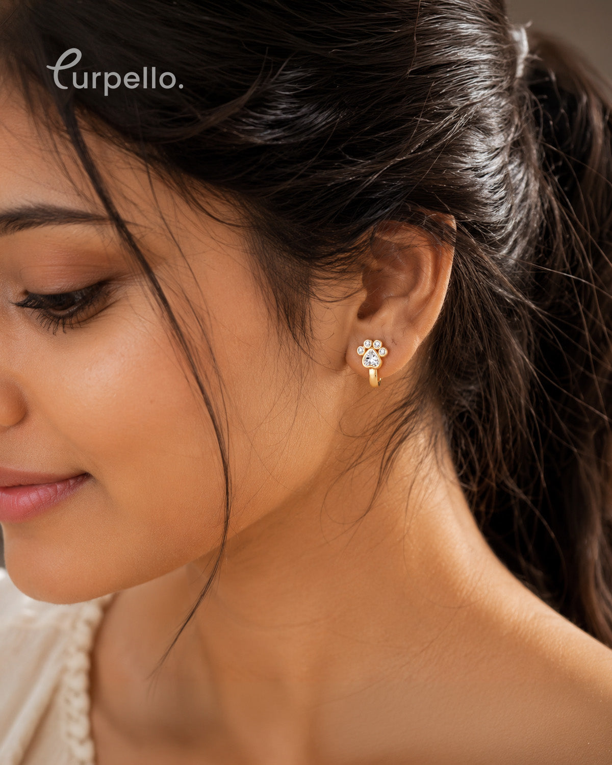 Purpello Crystal Paw Print Gold Huggie Earrings