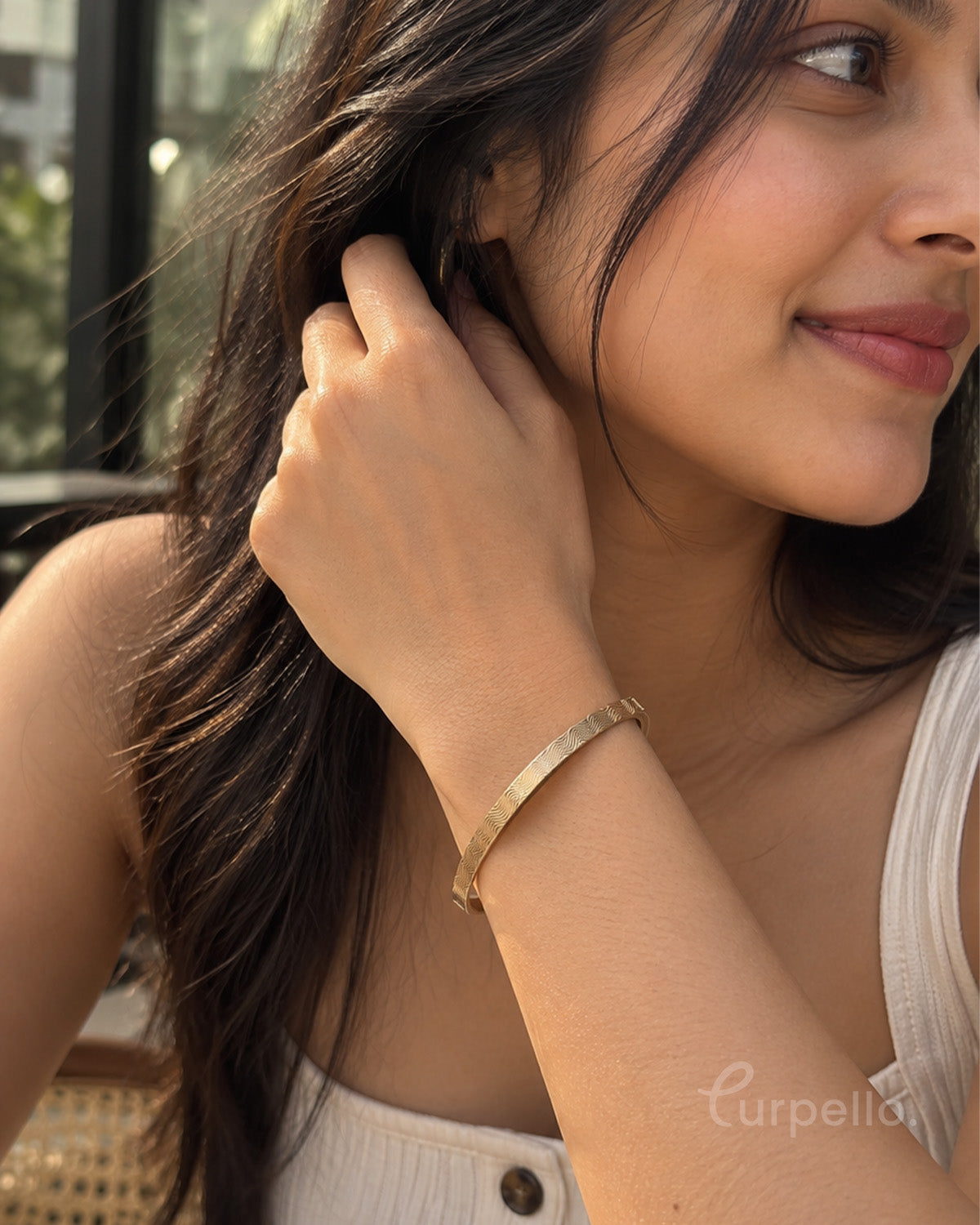 Celeste Criss-Cross Gold Bangle