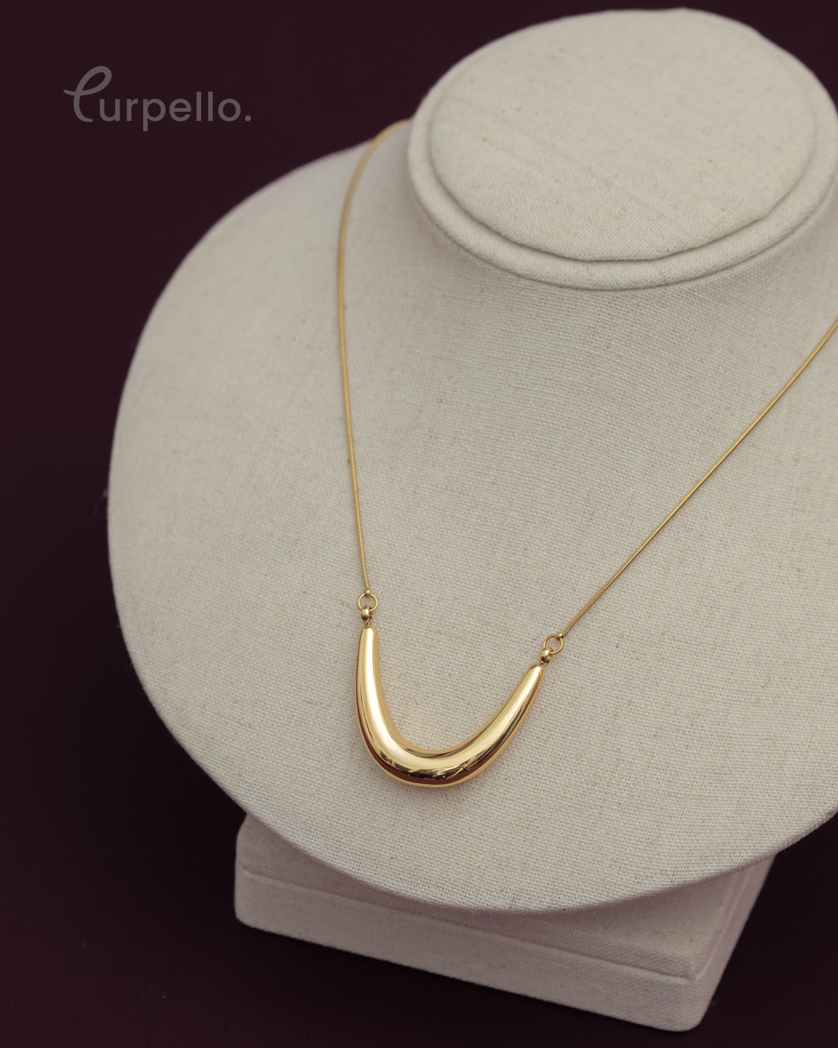 Purpello Gold Curve Statement Necklace
