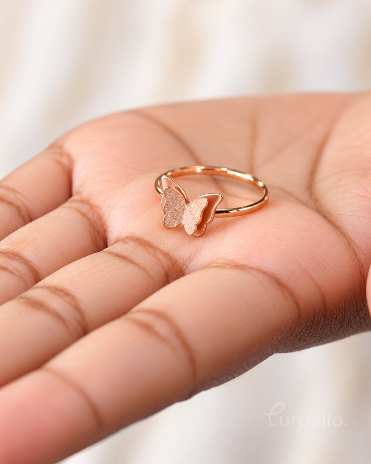 Flutter Glow – Rose Gold Butterfly Ring