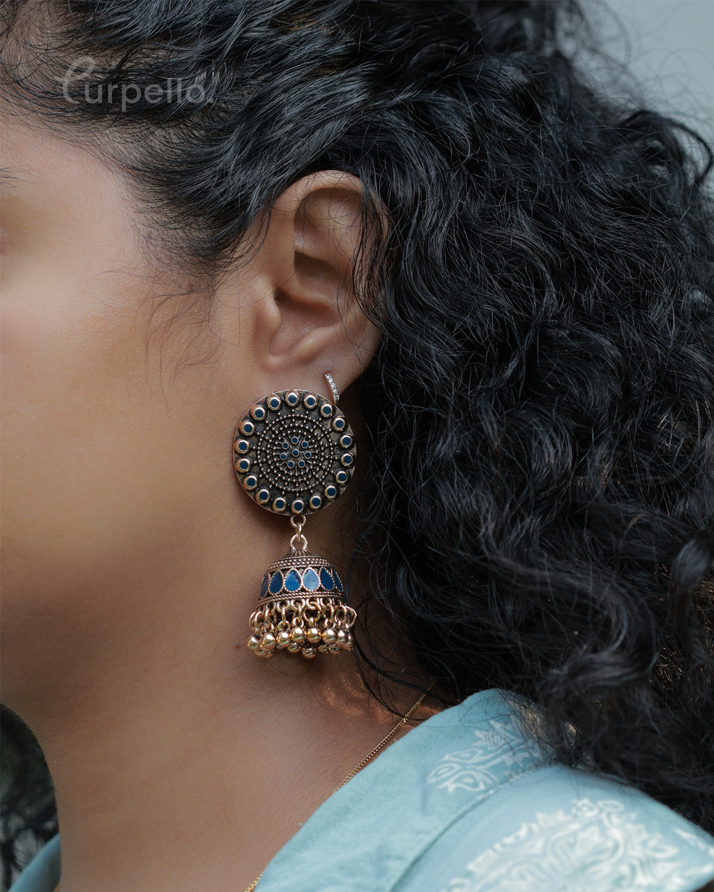 Purpello Antique Gold Jhumka Earrings with Blue Stone