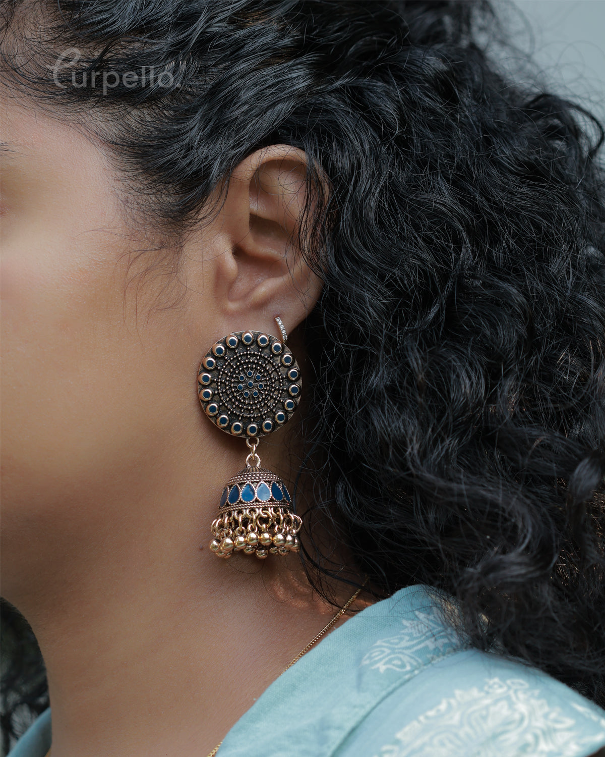 Purpello Antique Gold Jhumka Earrings with Blue Stone