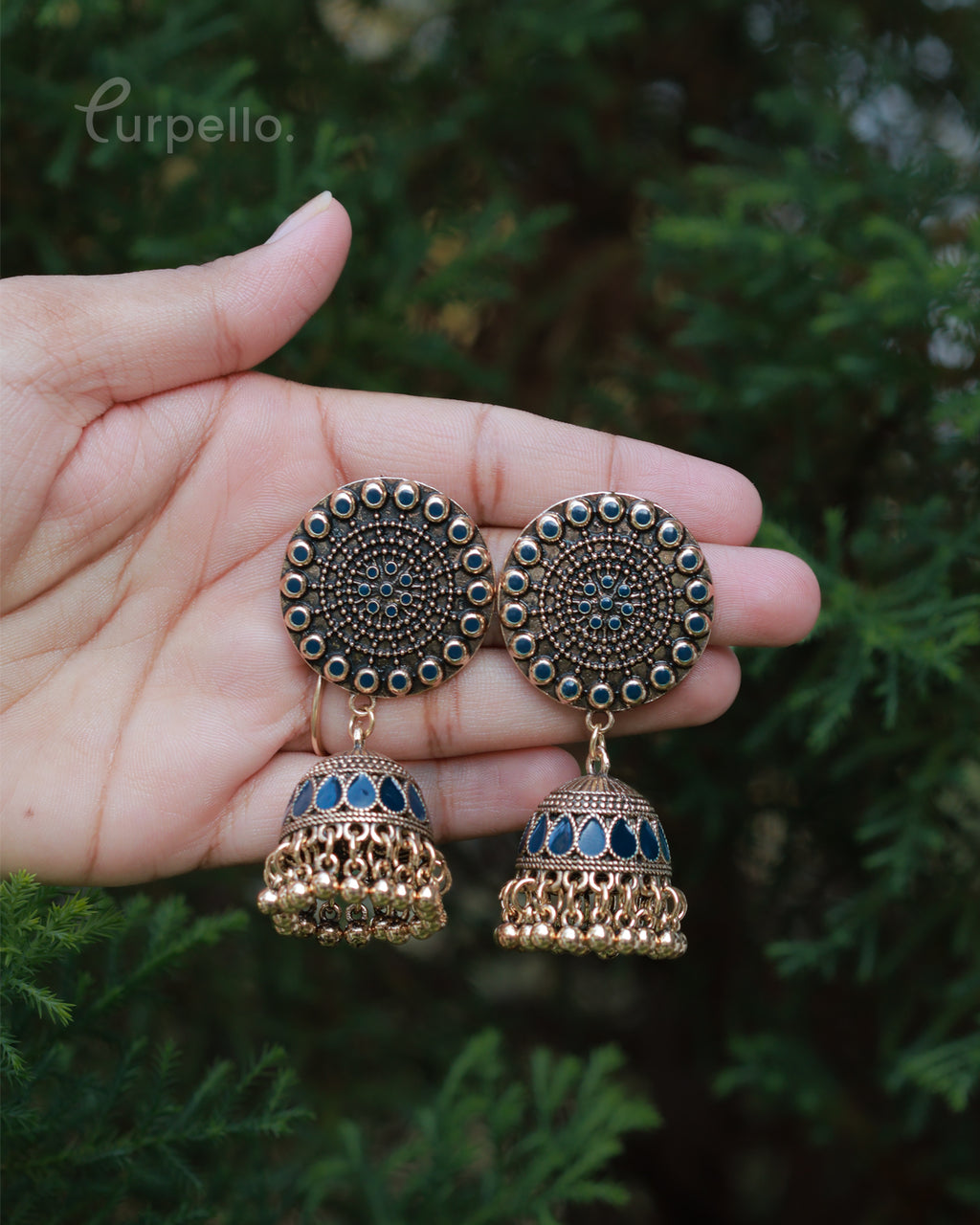 Purpello Antique Gold Jhumka Earrings with Blue Stone